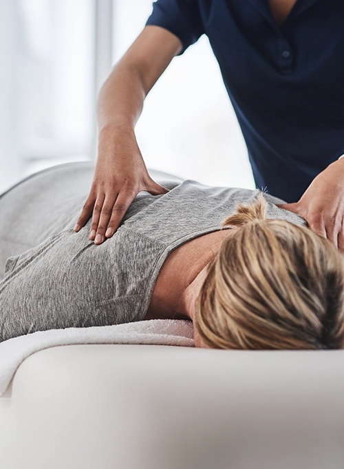 Chiropractic Kissimmee FL Woman Receiving Adjustment